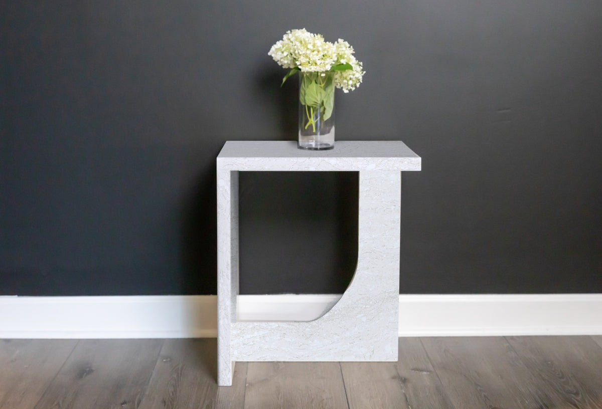 Quartz curved framed side table in Ironsbridge | Third Coast Stone